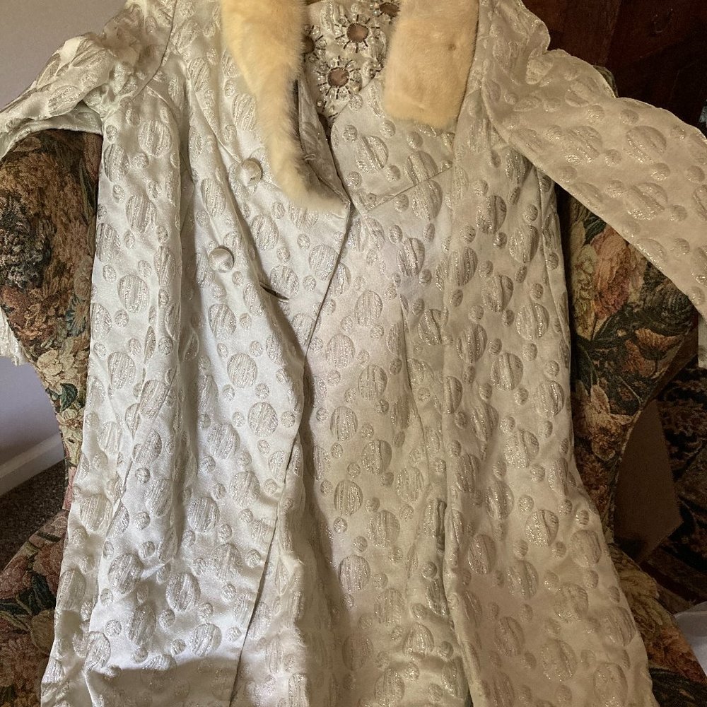 Vintage white long beaded gown and coat with mink collar.